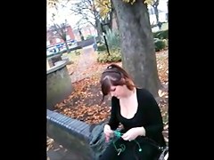 A dude is filming the cleavage of a sexy gal