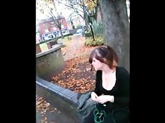 A dude is filming the cleavage of a sexy gal