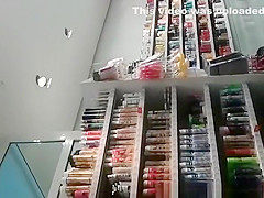 Blonde MILF in tight jeans pants at supermarket