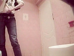 Busy girl peeping in bar toilet