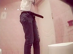 Busy girl peeping in bar toilet