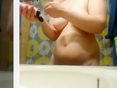 Chubby chick undressing and drying her body