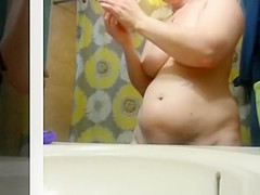 Chubby chick undressing and drying her body