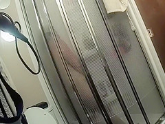 Chubby maid with saggy tits takes a quick shower