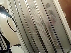 Chubby maid with saggy tits takes a quick shower