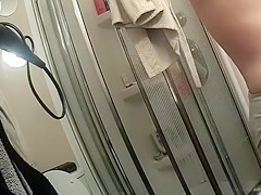 Chubby maid with saggy tits takes a quick shower