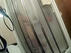 Chubby maid with saggy tits takes a quick shower