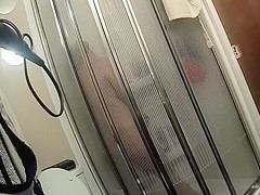 Chubby maid with saggy tits takes a quick shower