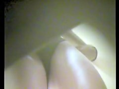Dressing room girl in panty thong and with nude pussy