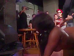 Ebony slave gets lezdom in public