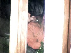 Female spied masturbating through the window of her bedroom