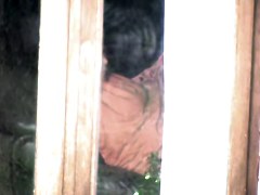 Female spied masturbating through the window of her bedroom