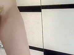 Girl with a hairy pussy showering off