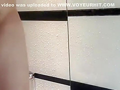 Girl with a hairy pussy showering off