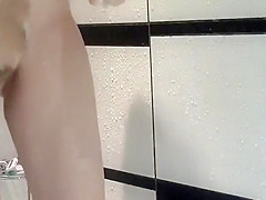 Girl with a hairy pussy showering off