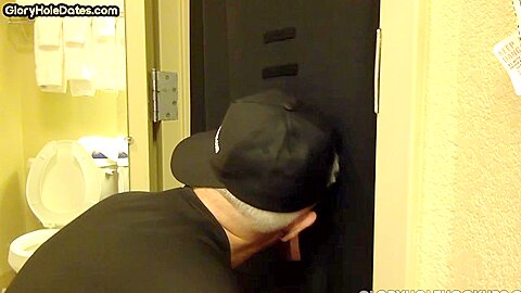 Gloryhole greedy amateur DILF sucks penis at his home