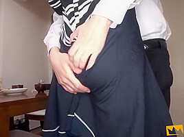 Guy Bangs A Sexy Japanese Girl While His Colleague Sits On The Table