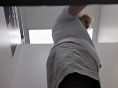 Hot granny is spied changing in the changing room