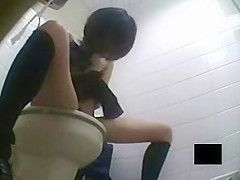 Japanese girl masturbates furiously in restroom