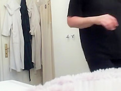 Mature woman changing in bathroom