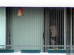 My slim blonde neighbor naked in her apartment