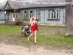 Naked on a motorbike