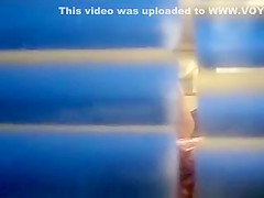 Peeping on a naked neighbor woman