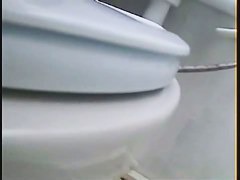 Porno of a Skinny white lady filmed taking a clear piss by