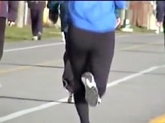 Running in the street amateur babe is shaking her candid ass 01t