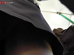 Secretly peeking up blondes petticoat