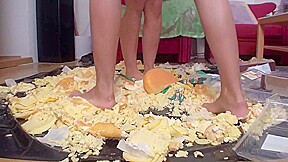 Sluts trampling food in the living room by Foot Girls
