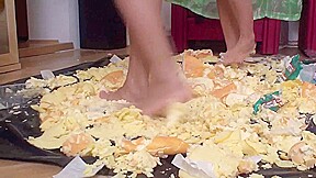 Sluts trampling food in the living room by Foot Girls