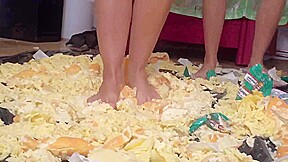 Sluts trampling food in the living room by Foot Girls