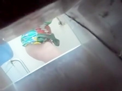 Spying on a curvy masturbating co-worker