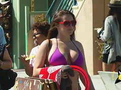 Street candid of a sexy girl in a tight purple bikini top