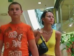 Tight skirts in the middle of the crowd in a shop
