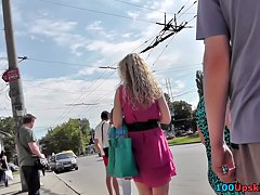 Upskirt cam presents blonde's succulent buttocks