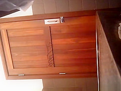 Woman lifts her long dress and takes a leak