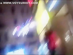 cutie pissing on a public sidewalk