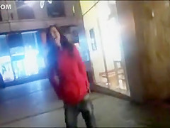 cutie pissing on a public sidewalk