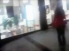 cutie pissing on a public sidewalk