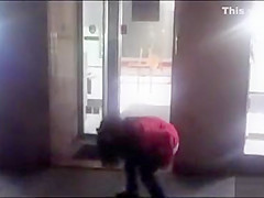 cutie pissing on a public sidewalk