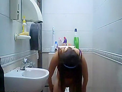 teen 18+ seats in toilet to take a pee